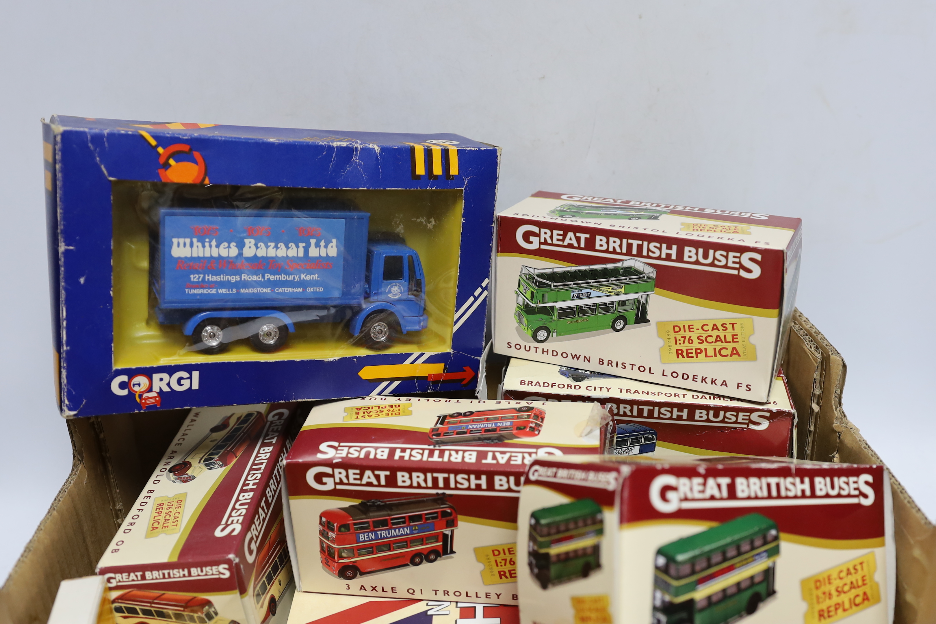 A quantity of boxed model cars, including Great British Buses, Corgi and Dinky